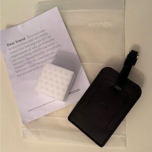 Monos luggage tag and cleaner